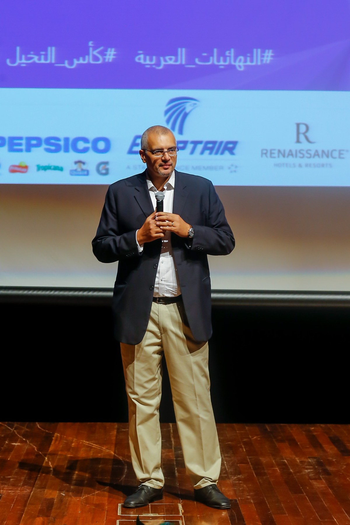 Sherif speaking on stage